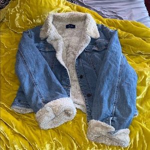 Fur lined denim trucker jacket